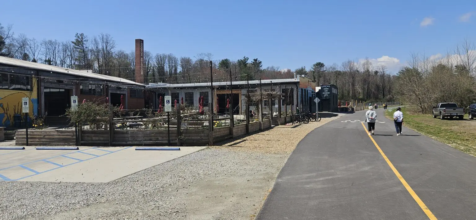 venture on the ecusta trail and stop at breweries and cafes starting your ride at Mile Marker 6 in Horse Shoe NC where Greenway ebike rentals will deliver and pickup your eBikes.